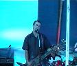 Mason Brown on stage at the Harbor Festival with ONAGER